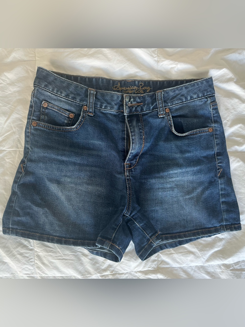 American Rag Blue Denim Jeans with Tan Stitching